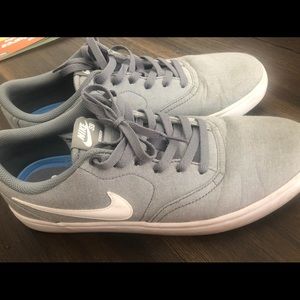 Grey Nike skate shoes